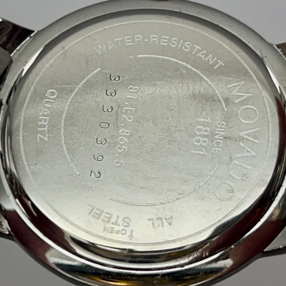 Movado Swiss Black and Silver Mens Watch Working